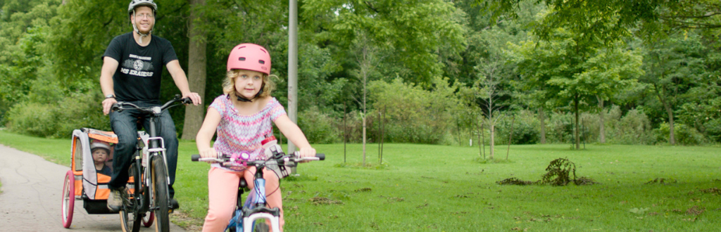 family biking together