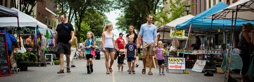 family at the farmers market 