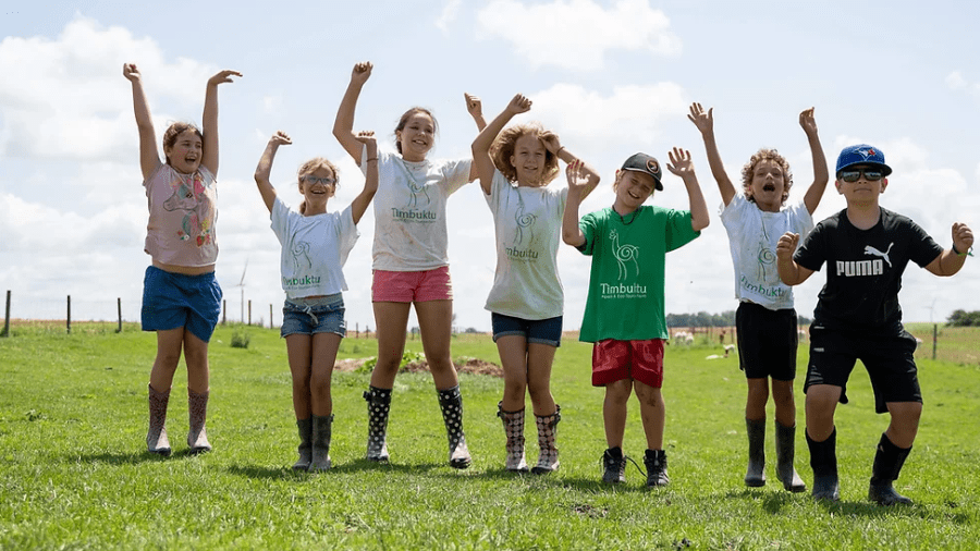 Childrend enjoying their visit to Timbuktu Alpaca Farm and Agri-Tourism Farm