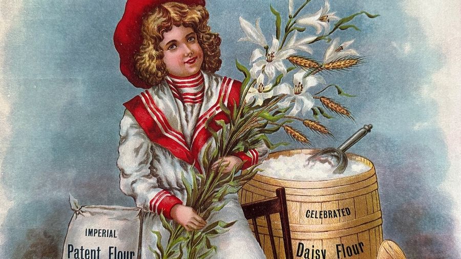 Girl holding wheat with flour 