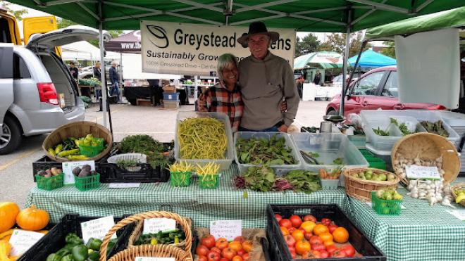 Husband and wife with their produce 