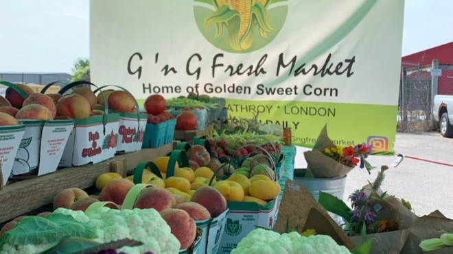 G 'N G market stand with fresh produce 