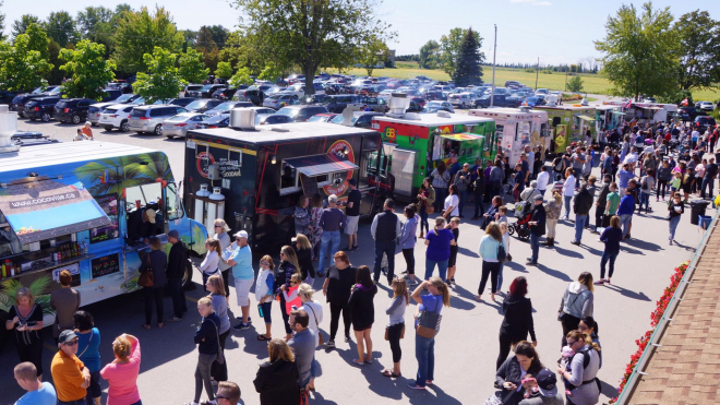 crowd of people lining up at Food Trucks 