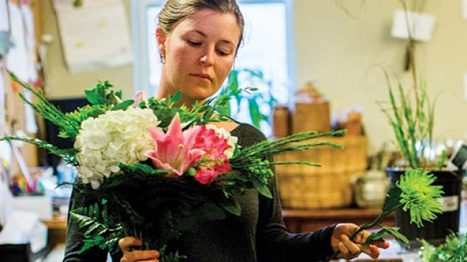 Woman arranging a bouquet 