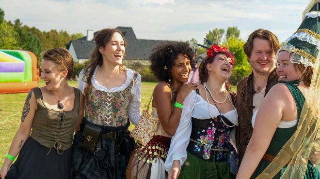 women dressed in fantasy costumes 