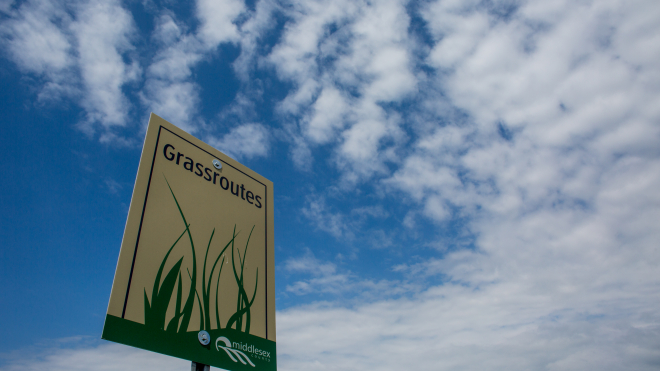 grassroutes sign