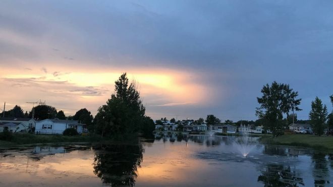 The Golden Pond at sunset, with RV campers in the background