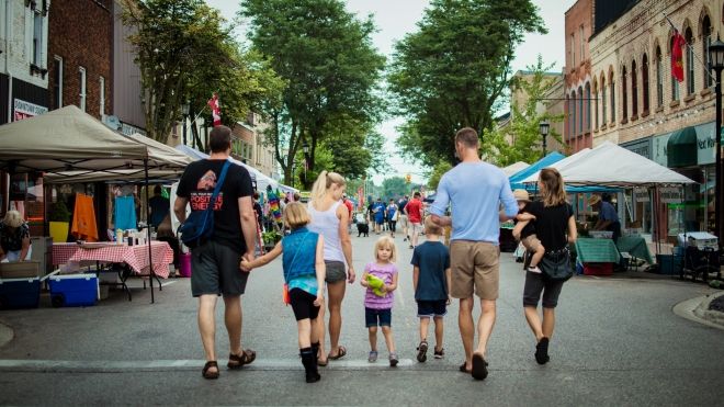 Family walking at a farmer's market 