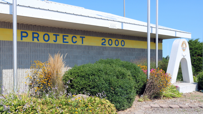 a sign on a building reading project 2000