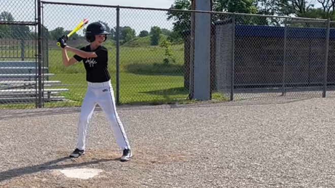 Little boy playing baseball 