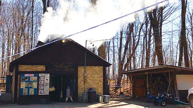 Sugar shack with smoke coming out 