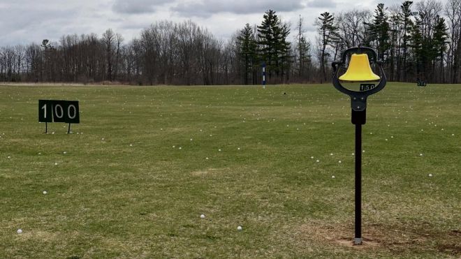 Golf course with a bell 