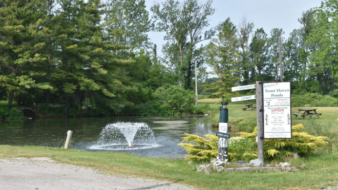 trout haven park body of water and sign 