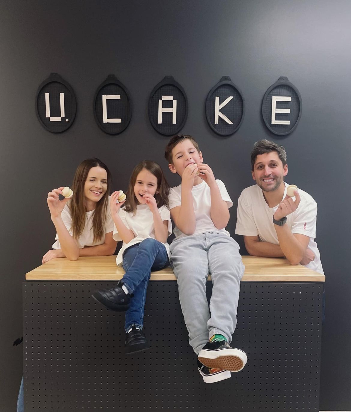 Mykola and Iryna Bilovol, with their two kids in the bakery.