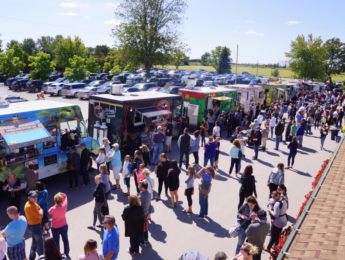 crowd of people lining up at Food Trucks