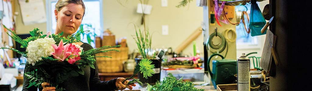 Woman arranging a bouquet