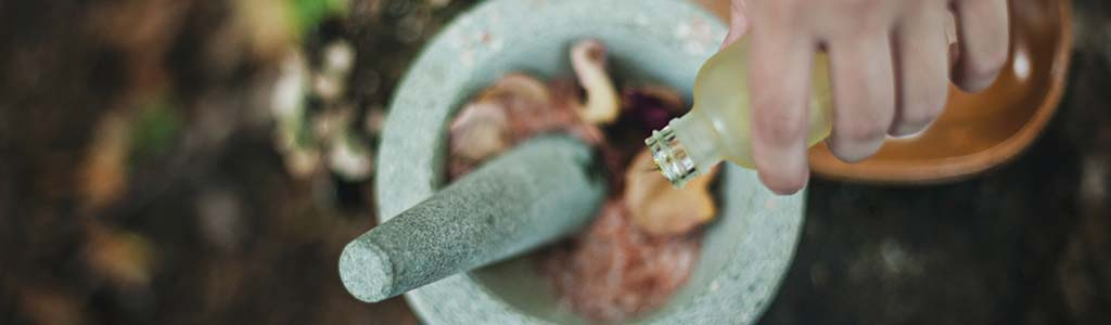 Mortar and pestle with roses