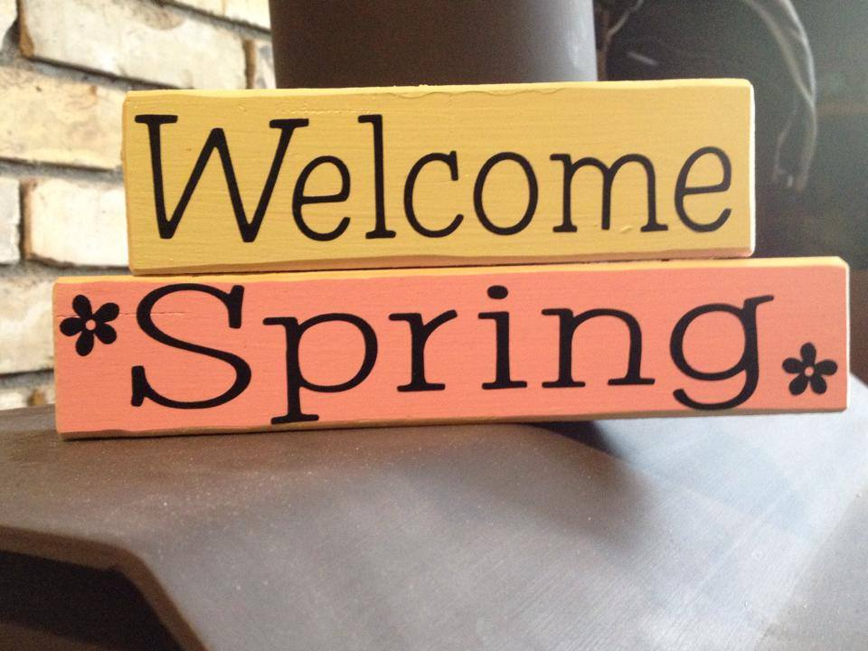 a sign that says "welcome spring" in yellow and orange by homegrown creations