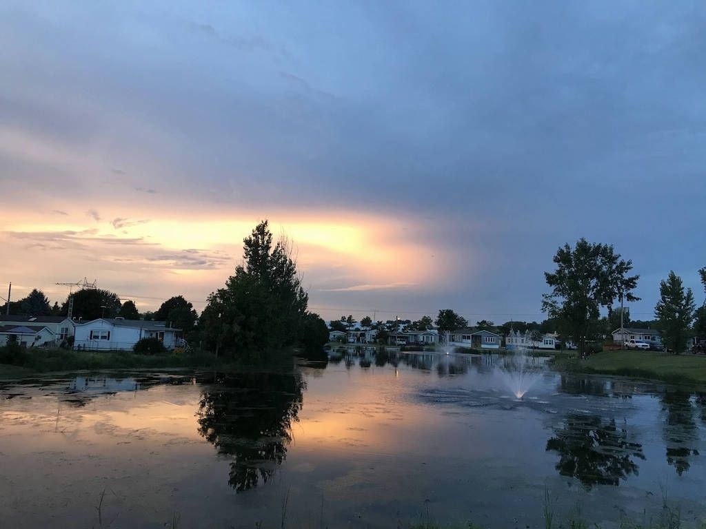 The Golden Pond at sunset, with RV campers in the background