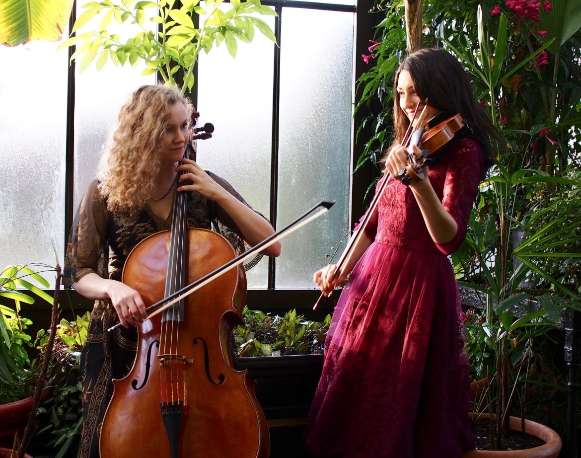 Two women with musical instruments