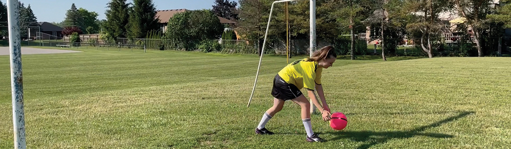 Girl playing soccer
