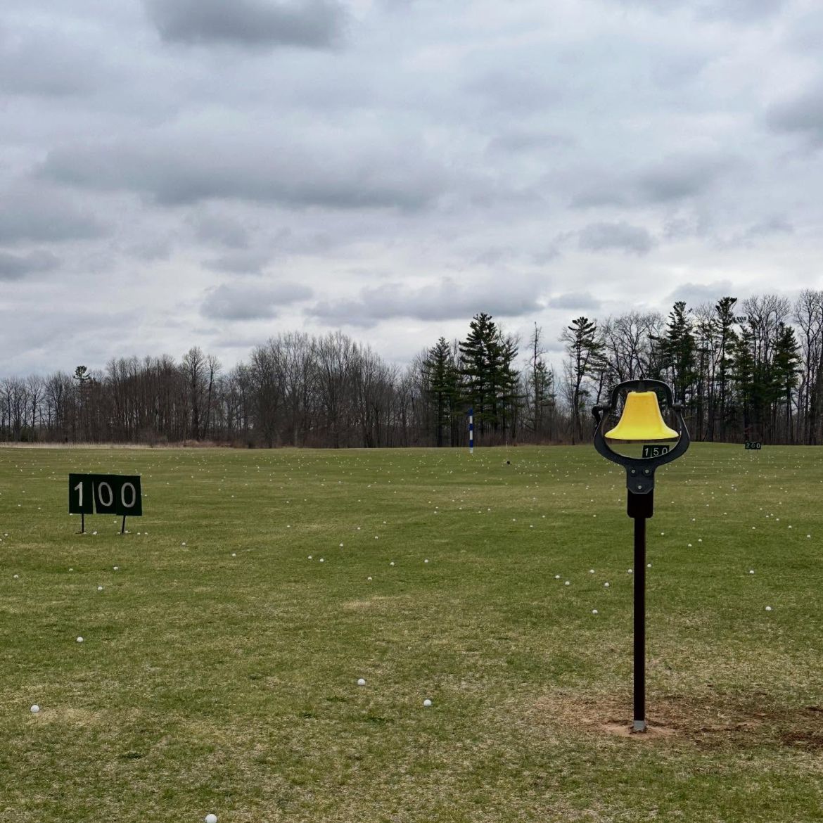 Golf course with a bell 