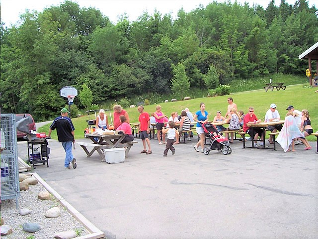 Group of people having a barbeque 