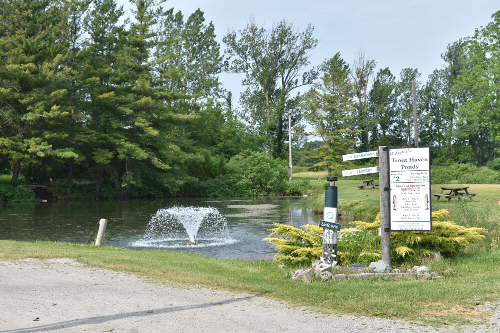 trout haven park body of water and sign