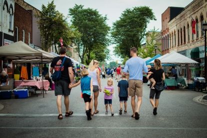 Family walking at a farmer's market 